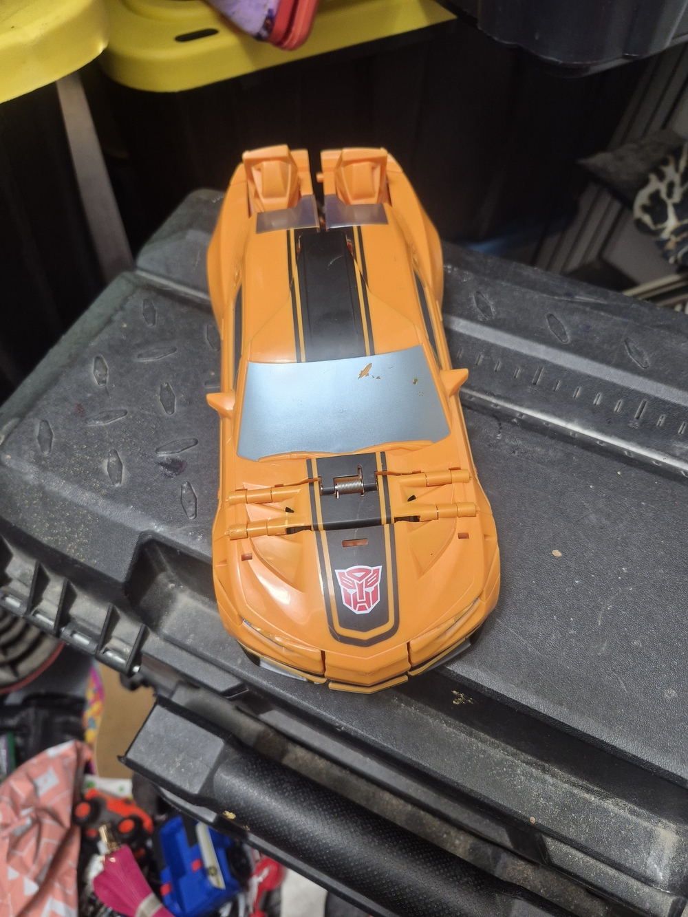 Orange Racing Toy Car with Black Stripes and Autobot Emblem - Kids Vehicle